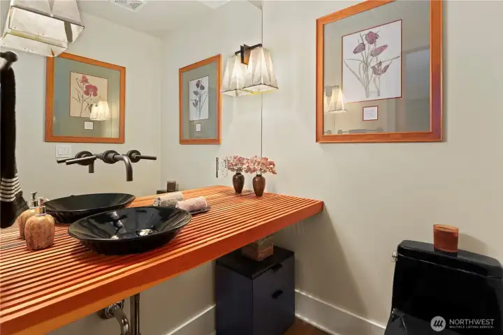 Powder room off the living room/kitchen