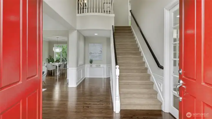 The spacious foyer with vaulted ceiling sets the tone for the rest of this stunning home.