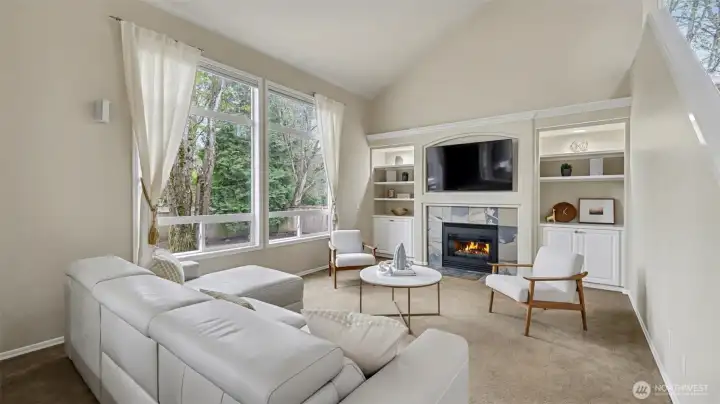 Gas fireplace with slate surround lend a casual elegance to the family room.