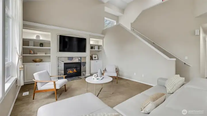 The dual staircases provide easy access to the upper level.