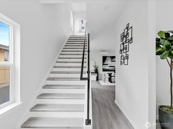 Stairs lead to upper