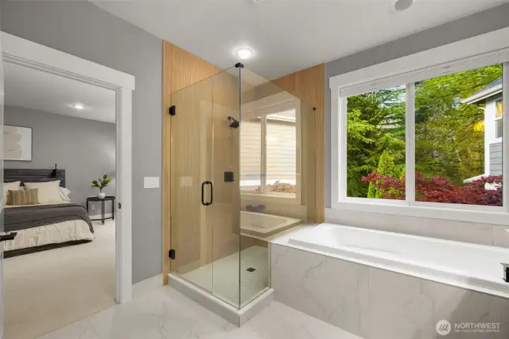 Get your day started in this luxuriously updated primary bathroom. It features modern fixtures, ample counter space, and a soothing color palette, creating a serene and inviting space for your morning routine.