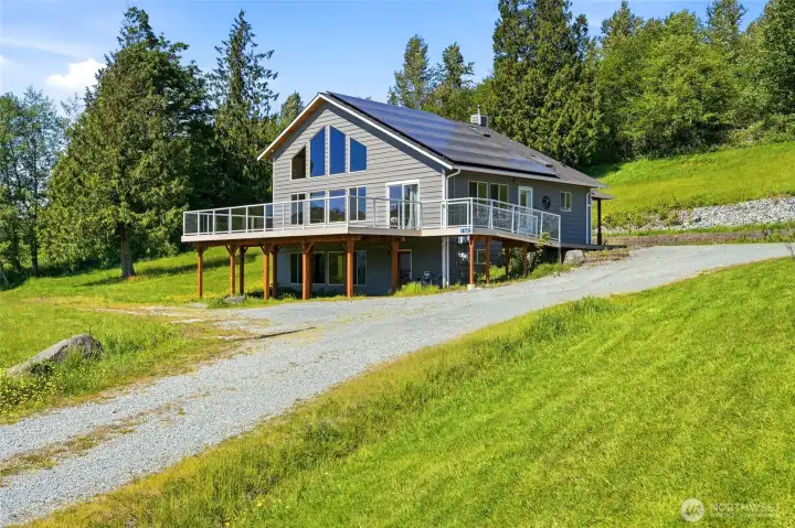 Big Lake views that stop you in your tracks daily.  Nearly 2.5 acres of pure privacy and breathing room.