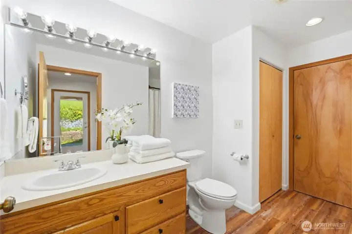 Full bath located on the main level that is accessible by Primary or hallway.