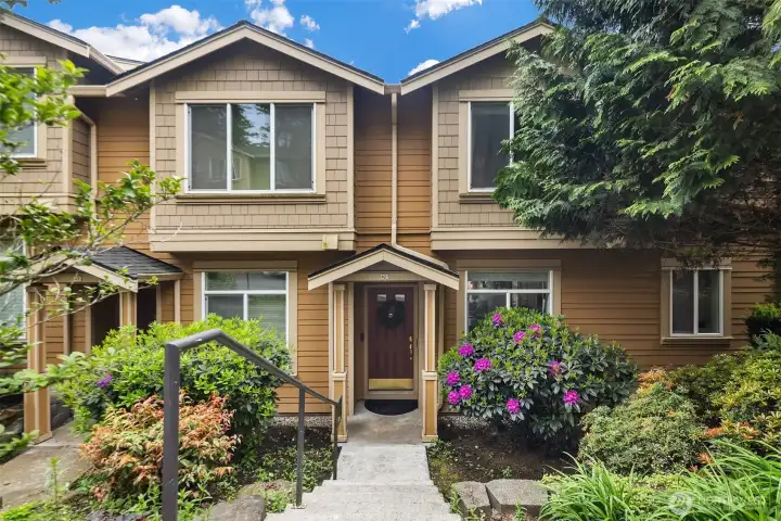 Welcome to this South-facing townhome that boasts ample natural light and Poo Poo point Views.