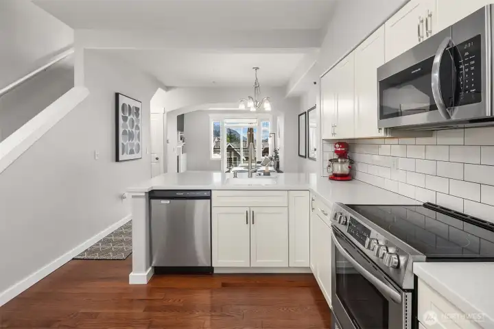 Spacious kitchen with ample flow to dining.