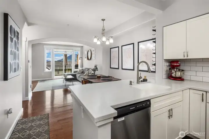 Seamless flow from kitchen to dining.