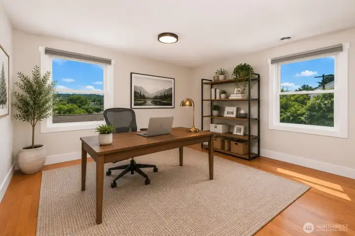 Main Floor Bedroom 2 - Virtually Staged as an office Main Floor Bedroom 2 - Virtually Staged as an office
