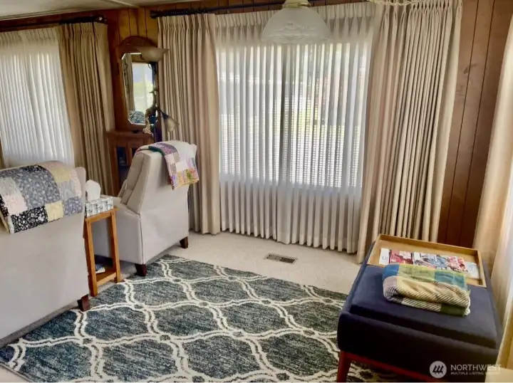 Entry, window treatments stay.