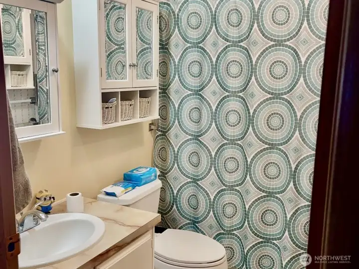 Bathroom with new toilet, cabinets & floors