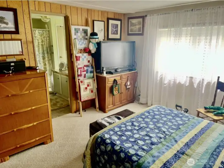 Primary bedroom with ensuite bathroom.