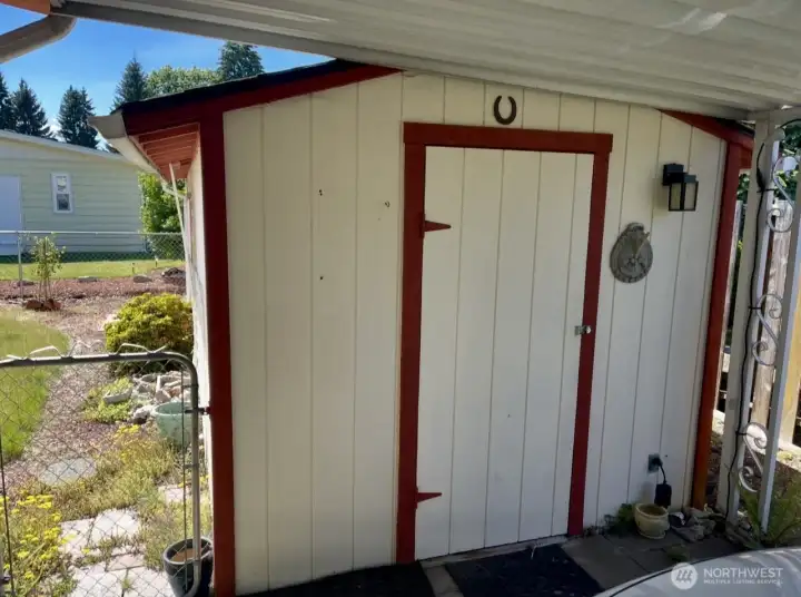 Entrance to Hobby Shed off of large 2 car carport