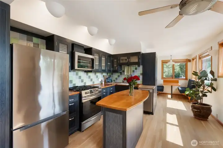 The custom kitchen is stunning with new appliances and custom cabinetry. The custom kitchen is stunning with new appliances and custom cabinetry.