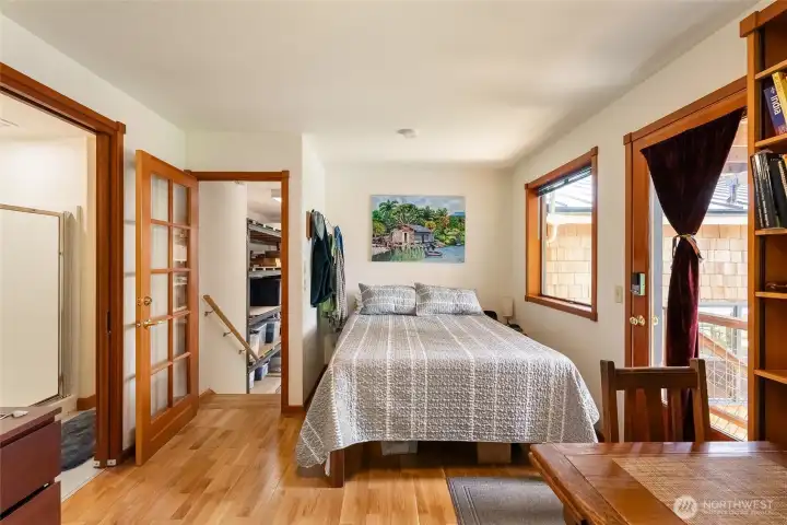 Bedroom space on th3 main level with access to the lower level of the deck Bedroom space on th3 main level with access to the lower level of the deck