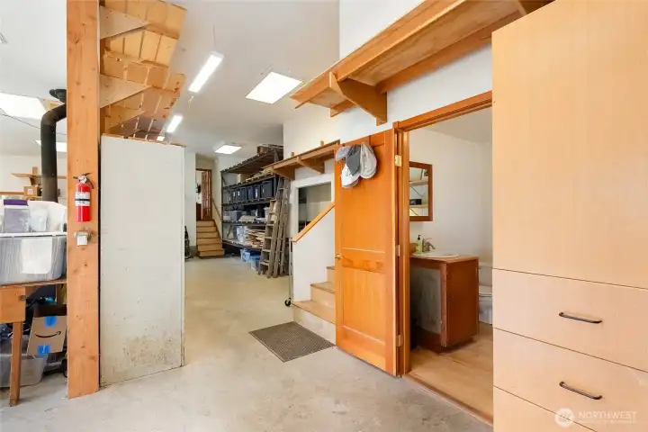 On the main level, adjacent to the garage, is an office/ bathroom On the main level, adjacent to the garage, is an office/ bathroom