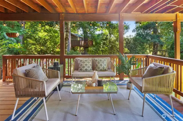 Lower Level Covered Deck overlooks backyard