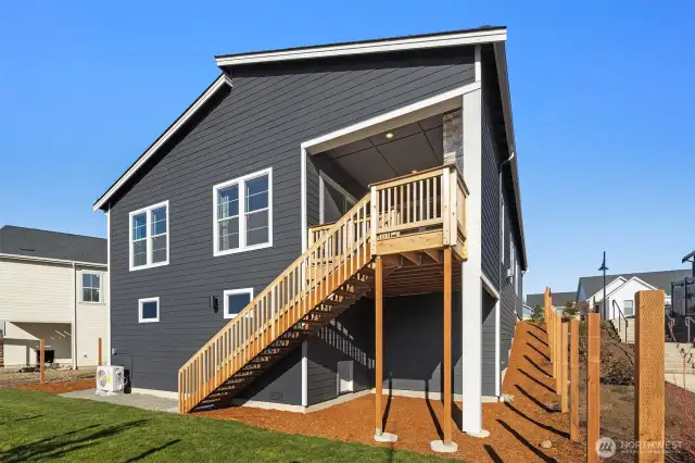 Rear view of covered deck and tall crawl space for extra storage