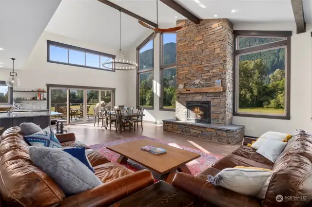 The seamless flow between the living, dining, and kitchen areas create an entertainment dream.