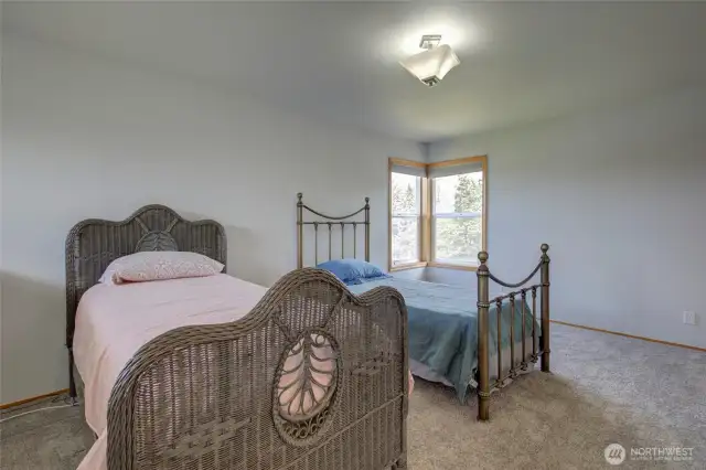 Next, we ascend the spiral stairs and enter the sleeping loft with large closet.