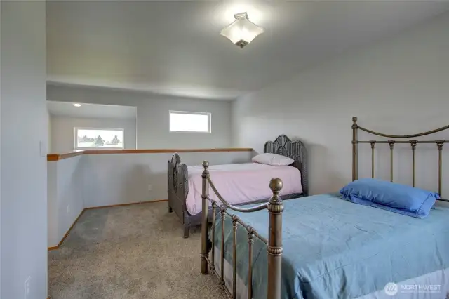 The loft, as it is, shares those water views and would also be a wonderful office, den, craft room....or whatever flex space you need!