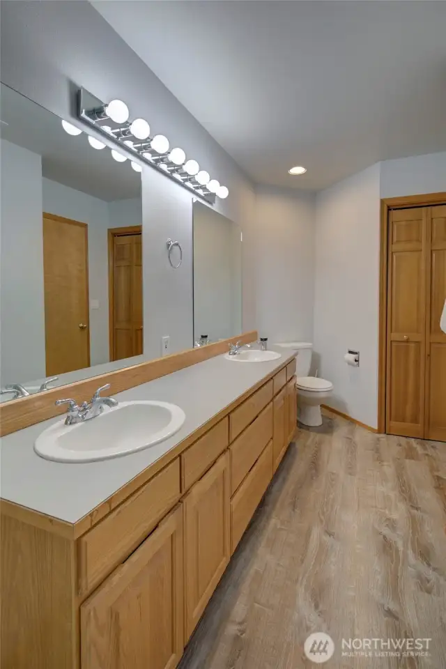 Primary bathroom is large, with dual vanity, insta-hot and more storage.