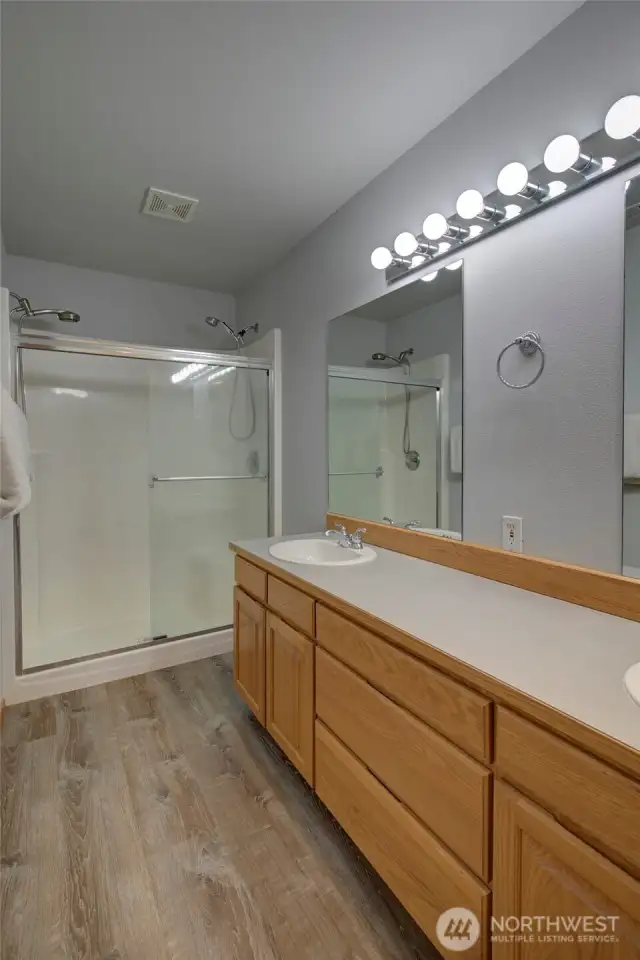 Spacious double headed shower rounds out the primary bath.