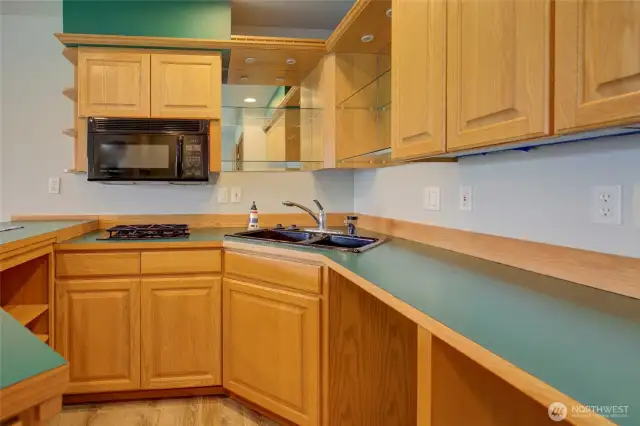 Dual propane range, microwave, insta-hot, plumbed for an ice maker and room for small fridge!