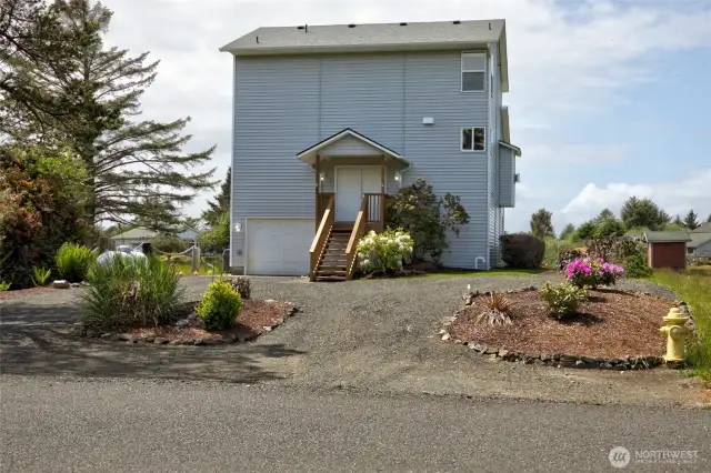 Beautiful, mature landscaping out front offers curb appeal.