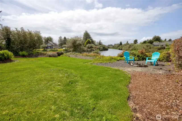 Firepit by the water is a great place to relax and socialize with loved ones.
