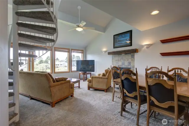 Touring inside this beautiful home, the front doors lead into the second floor, where the main living area is.
