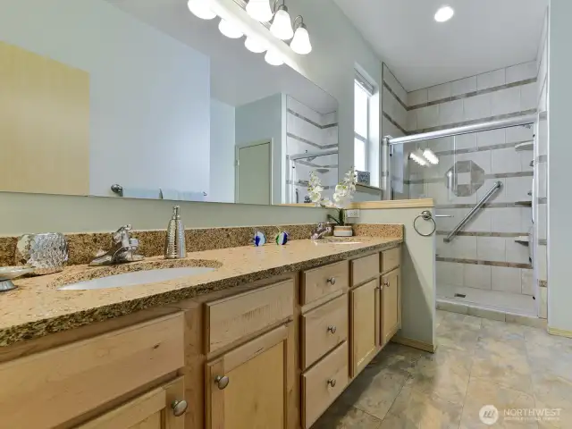 Primary bath has two sinks.  Granite new sinks and hardware. Full length mirror.