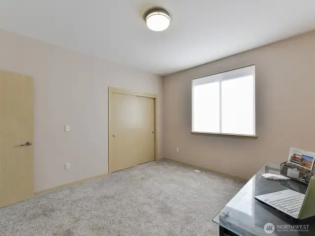 Office/ bedroom with closet.