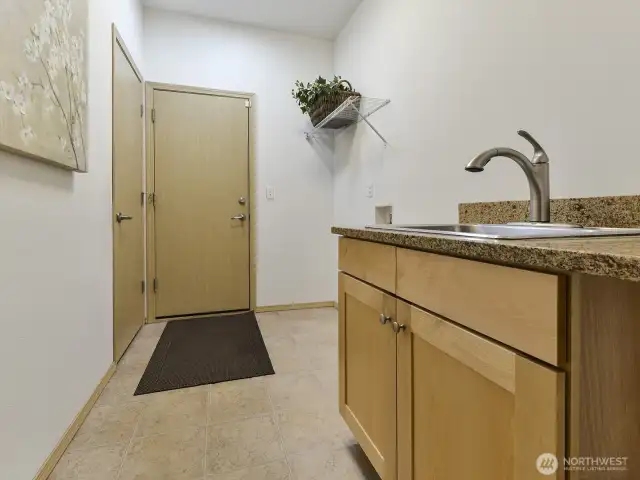 Utility room has extra closet for storage. Access from the garage.