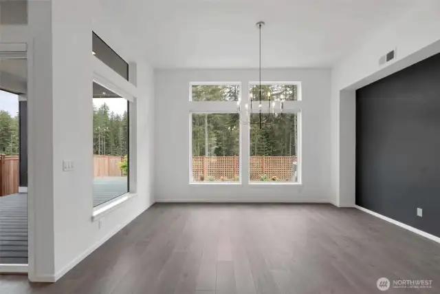 Elegant dining room with large windows for plenty of natural lightli