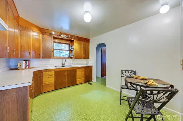 Custom cabinets and entrance to the downstairs bedroom
