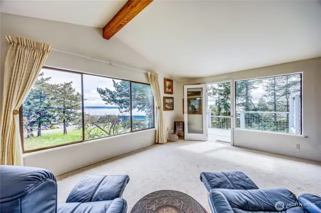 Big windows for a big view with a deck viewing Indian Island cut and Mt Rainier.