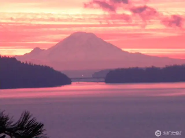 Sunrise view of Mount Rainier enhanced just beyond the Indian Island Bridge.