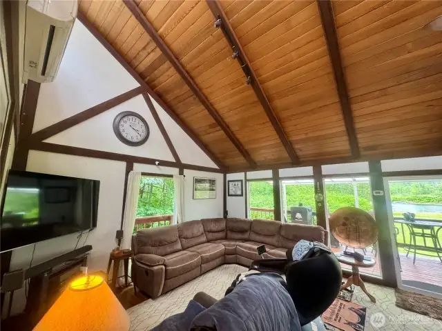 Great room with vaulted ceiling and natural light