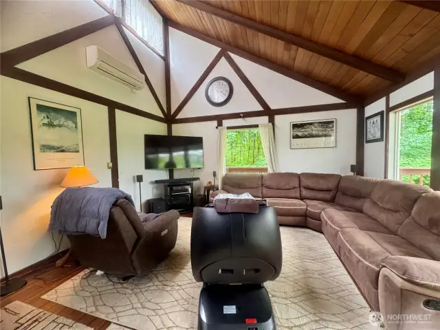 Great room with vaulted ceiling and natural light