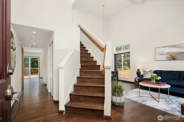 Gracious entry with beautiful hardwood floors throughout