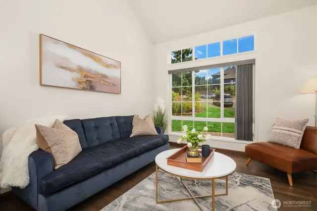 Bright and airy living room with soaring ceilings and lots of natural light