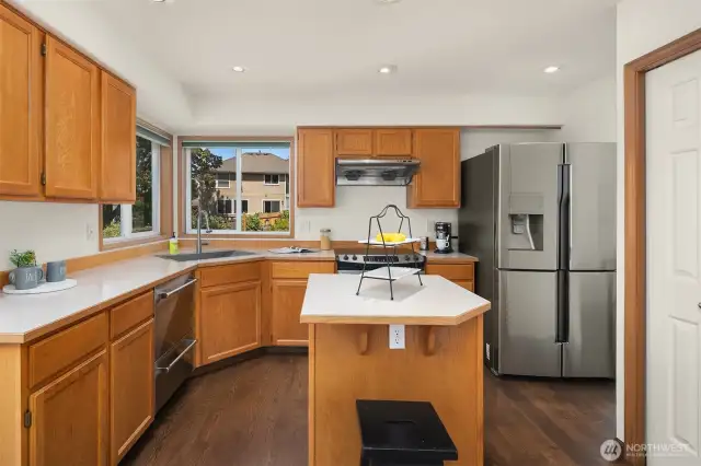Kitchen with a dining nook and pantry storage