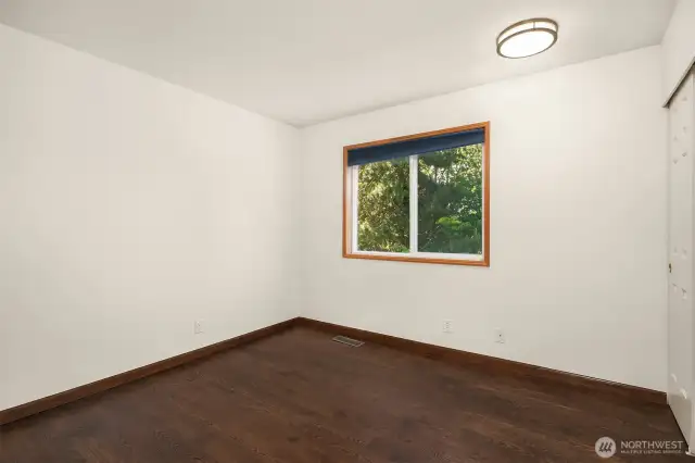 One of the 3 bedrooms on upper level