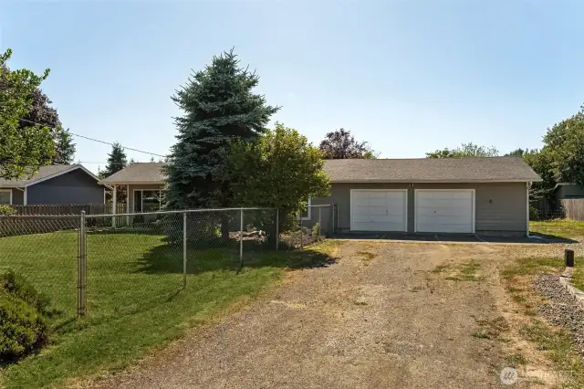 Oversized 2-car garage and circular driveway.