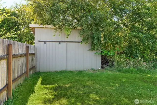 Storage shed on adjacent lot.
