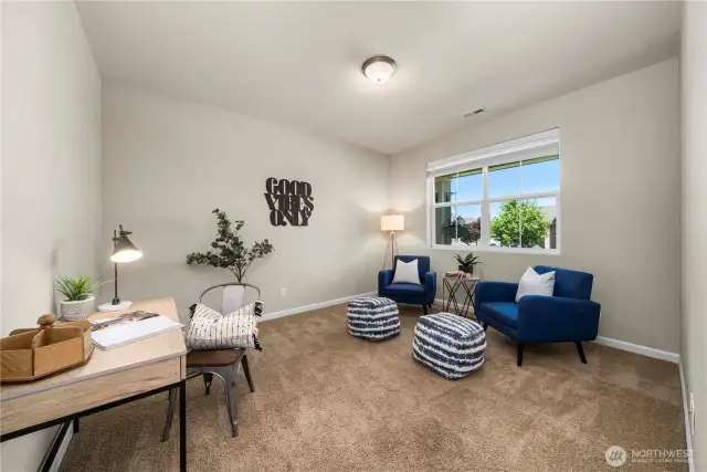 Large den/ office to the right of the front door.