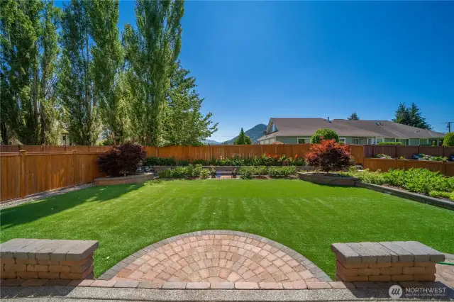 Easy maintenance landscaping always green with synthetic turf grass.