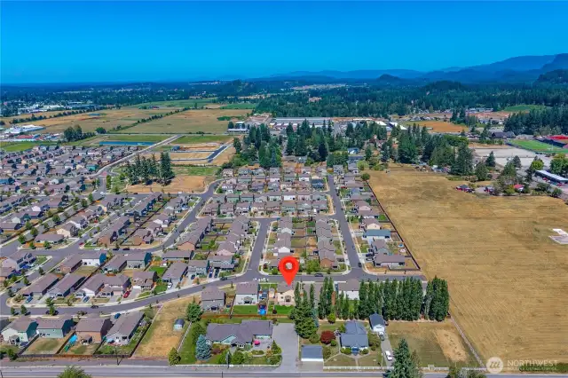 Walkable community with large city playground a block away.