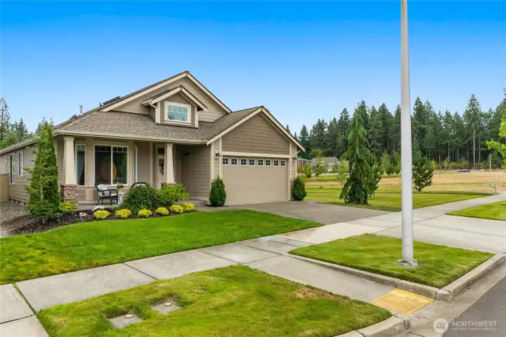 Great curb appeal on an end lot adjacent to the resource parcel so you will never have a home adjacent to the south side of the house.