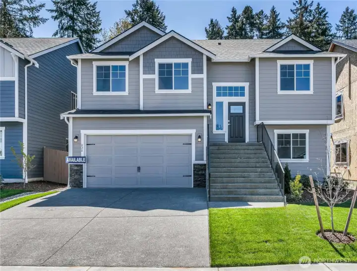 **This home is under construction** Photos are of same plan in the community. Colors and features will vary.